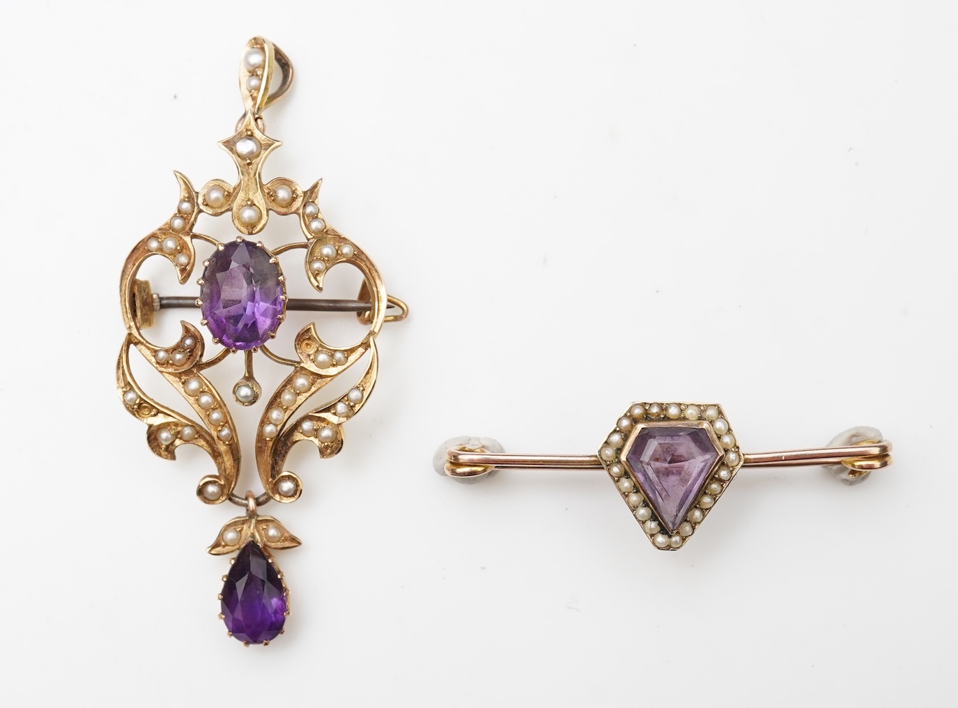 An Edwardian amethyst and seed pearl pendant and bar brooch, early 20th century